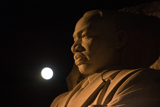 Photo Credit: (NASA/Aubrey Gemignani) The moon, or supermoon, is seen as it sets over the Martin Luther King Jr. Memorial on Monday, Nov. 14, 2016 in Washington. A supermoon occurs when the moon’s orbit is closest (perigee) to Earth. Early Monday morning, the moon was the closest it has been to Earth since 1948 and it appeared 30 percent brighter and 14 percent bigger than the average monthly full moon.